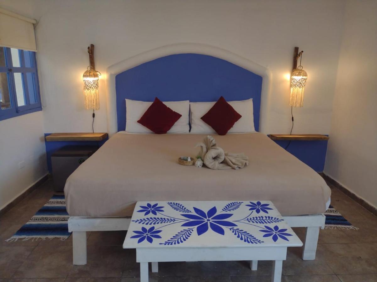 Mio Tulum Hotel Boutique エクステリア 写真 A bedroom in a hotel in Santorini, Greece